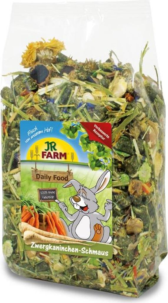 A bag of rabbit food with a cartoon rabbit and vegetables on the label.