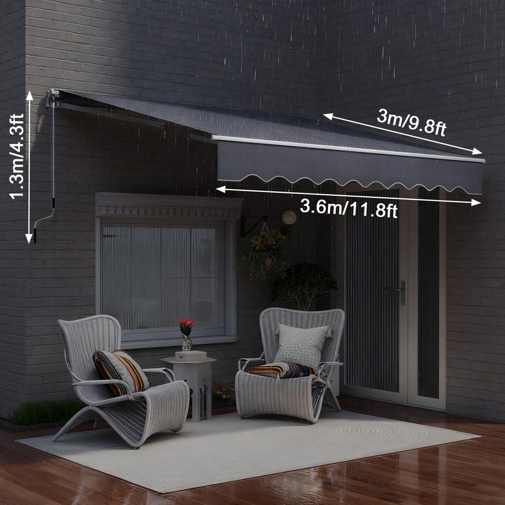 An awning is installed over a patio door, with two chairs and a small table set up on the patio.
