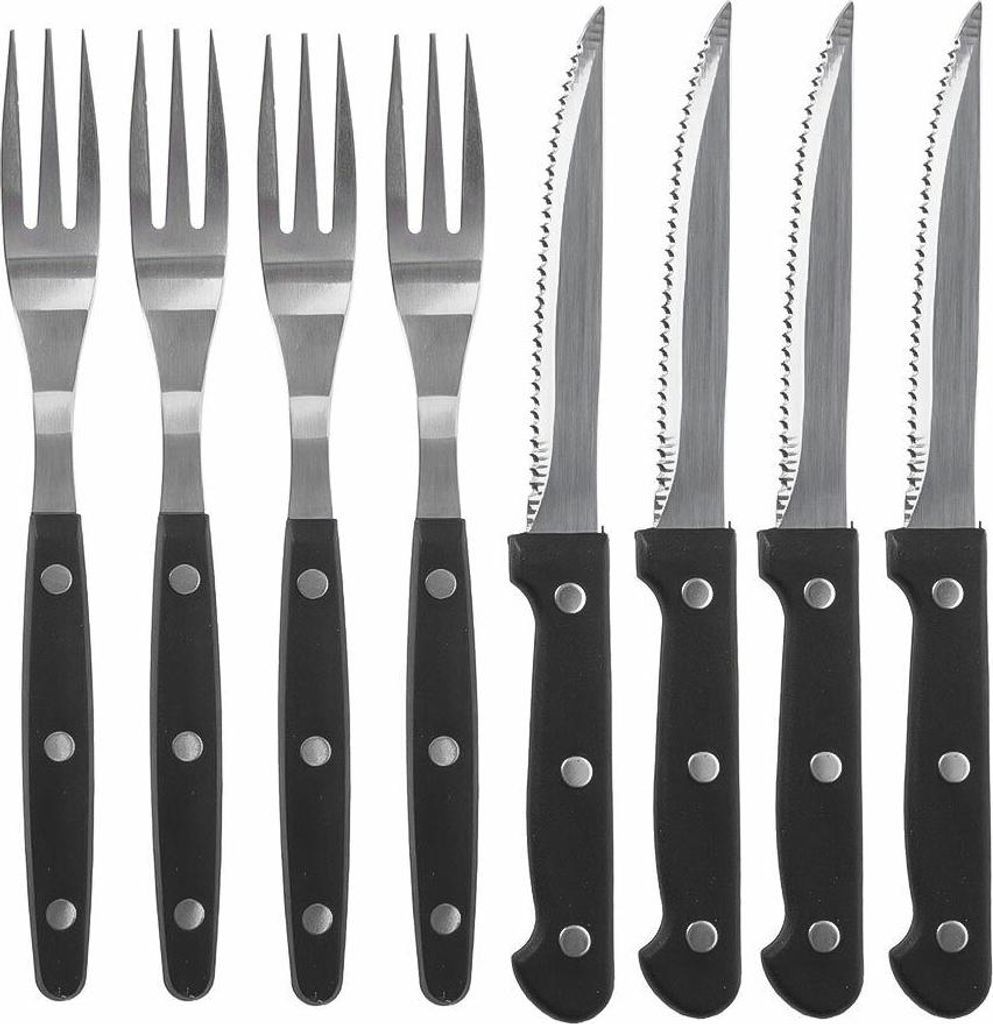 A set of steak knives and forks arranged neatly.