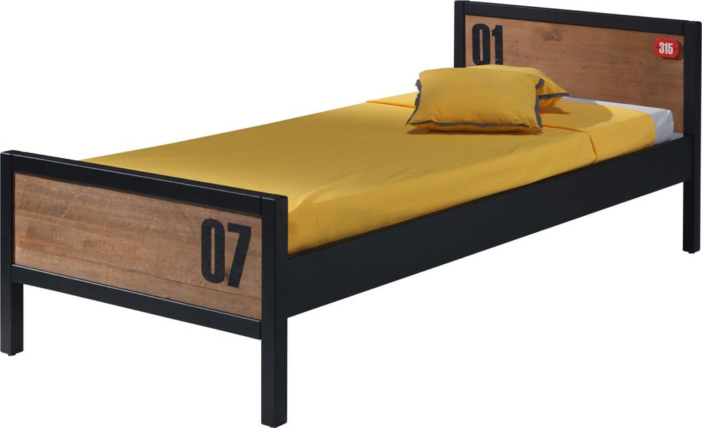 A single bed with a yellow comforter and pillow, set against a white background.