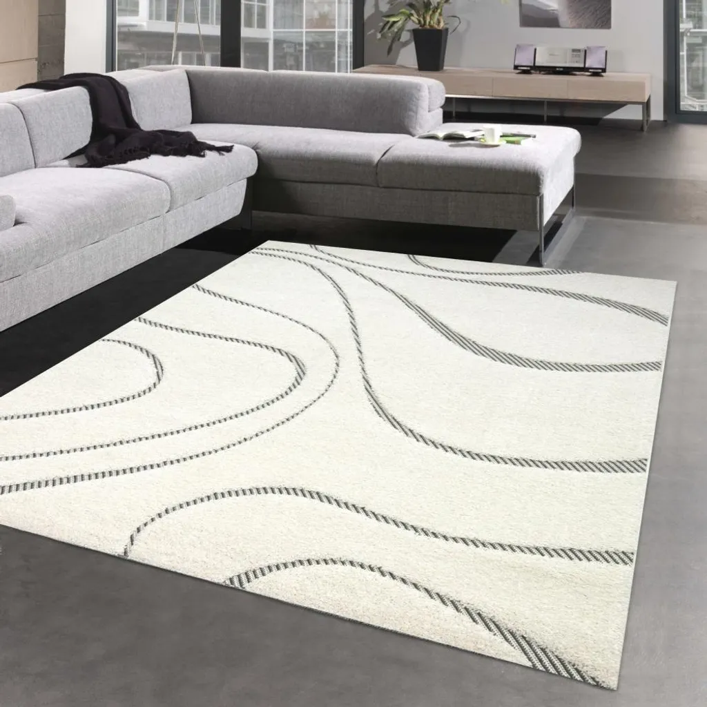 Grand tapis de chambre moderne 140x200 cm effet vagues douces et cosy
