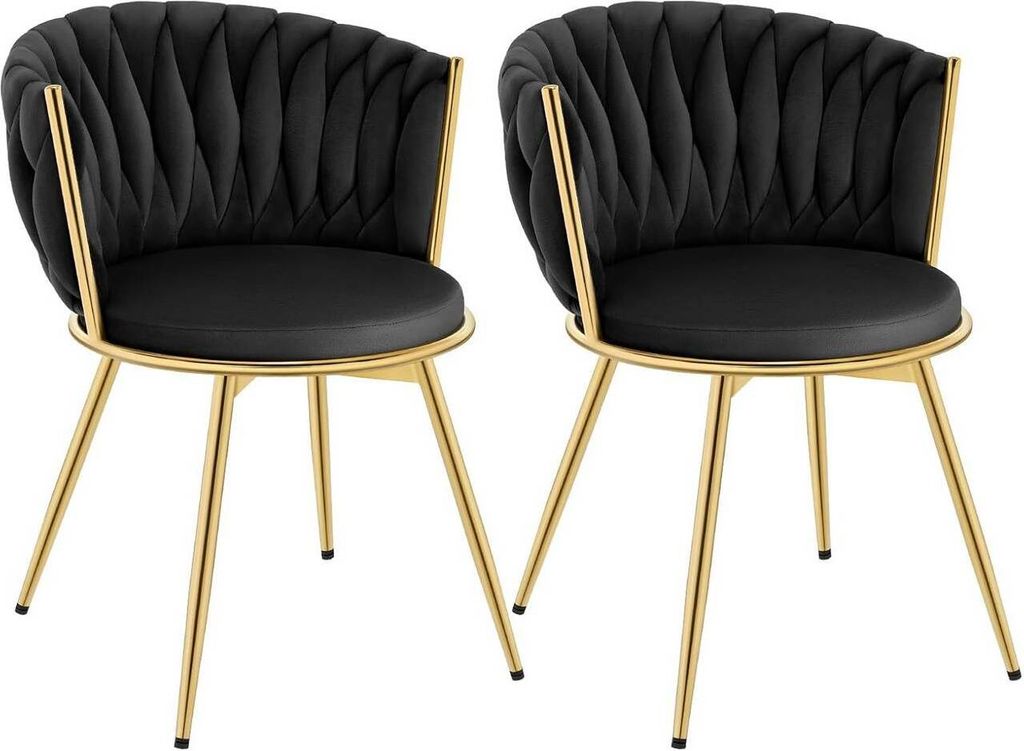 Two black velvet chairs with gold metal legs are shown against a white background.
