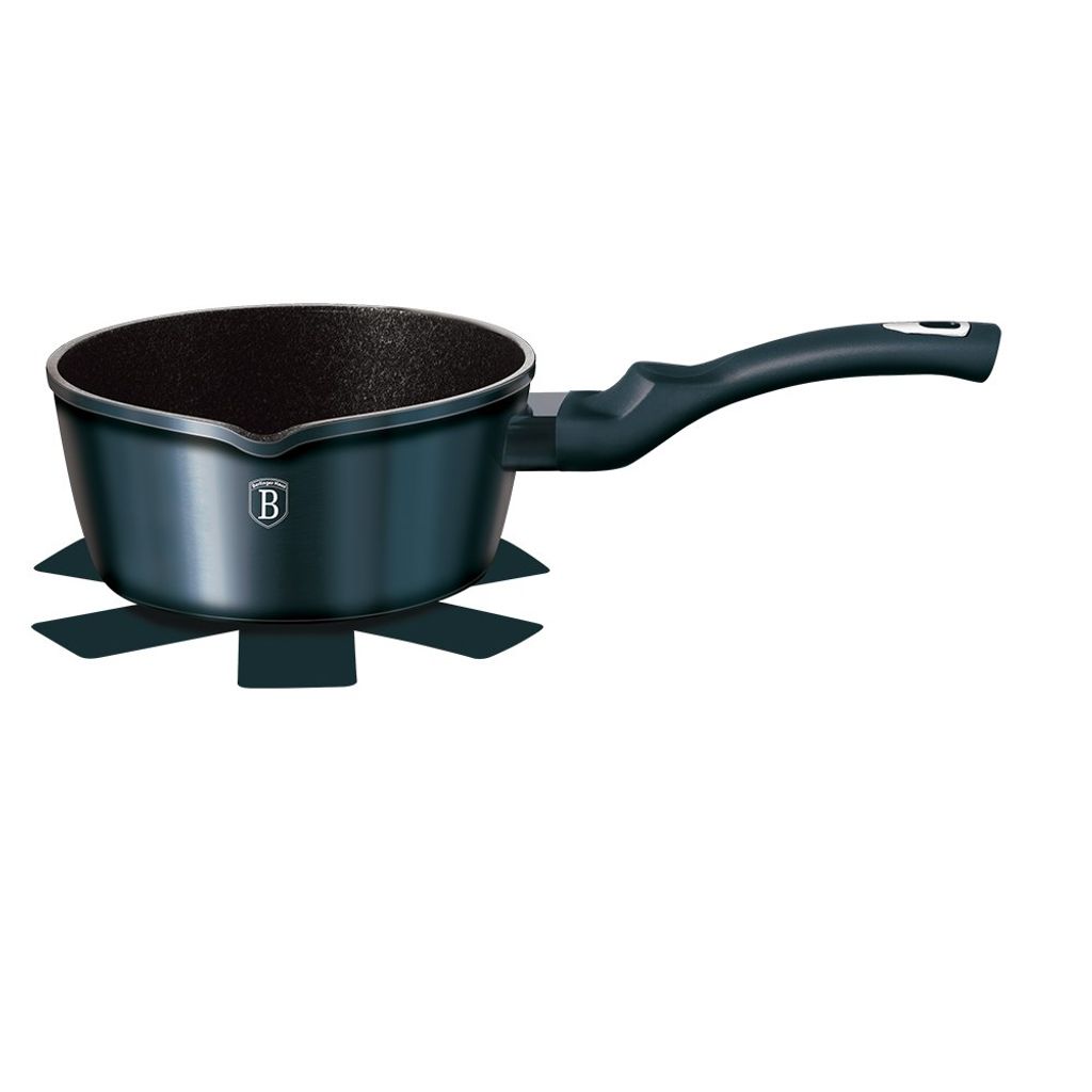 A dark gray steelpan with a black interior and a black handle, shown from a side angle on a white background. It is sitting on a dark gray trivet.