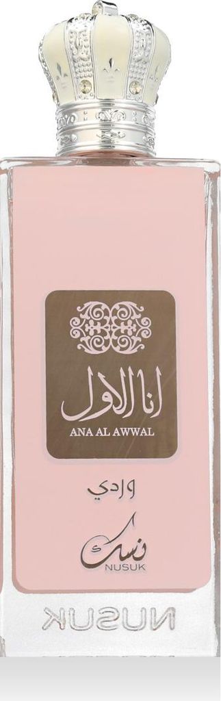 A close-up studio shot of a perfume bottle with a pink body and a crown-shaped cap.