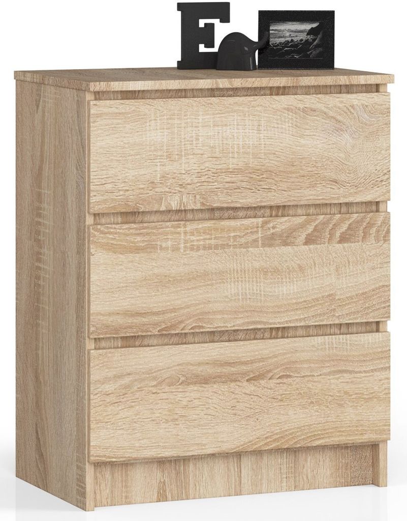 A light brown wooden chest of drawers with three drawers.