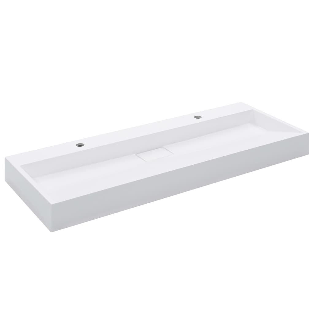 A white rectangular sink with two faucet holes and a small drain area.
