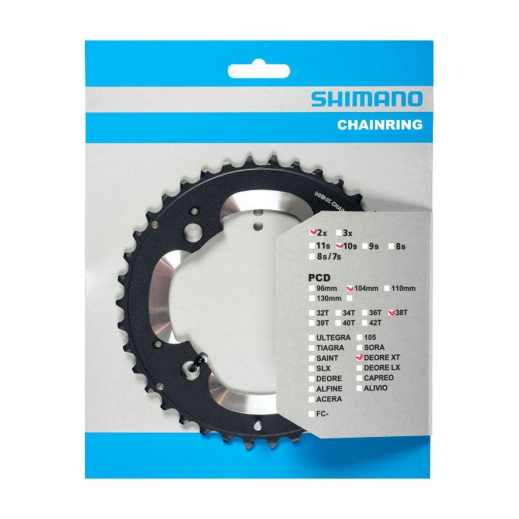 A product shot of a Shimano chainring in its retail packaging.