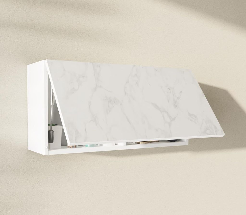 A white wall-mounted cabinet with a marble-patterned door is shown slightly ajar.
