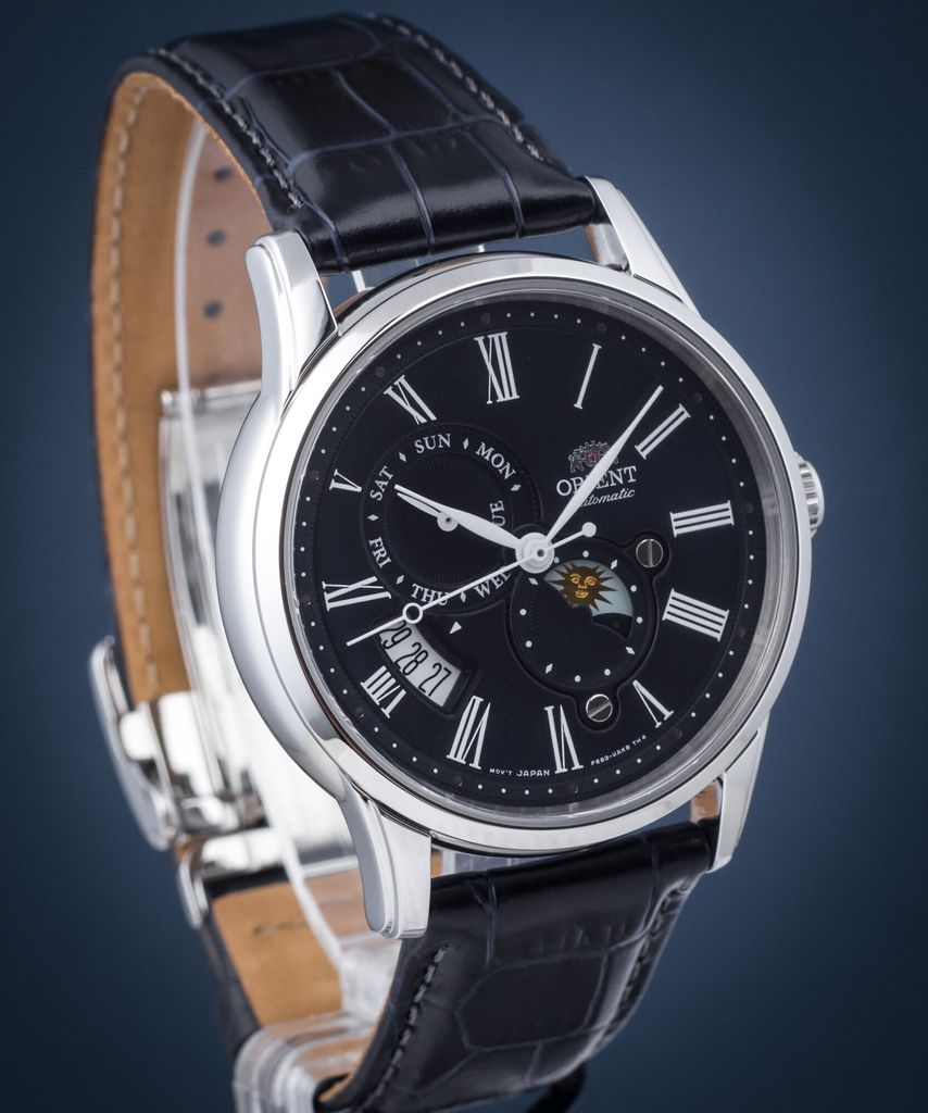 A close-up studio shot of a men's wristwatch with a black dial and a black leather strap.
