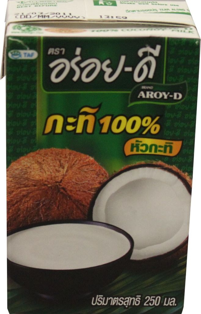 A carton of coconut milk with an image of coconuts and a bowl of coconut milk.
