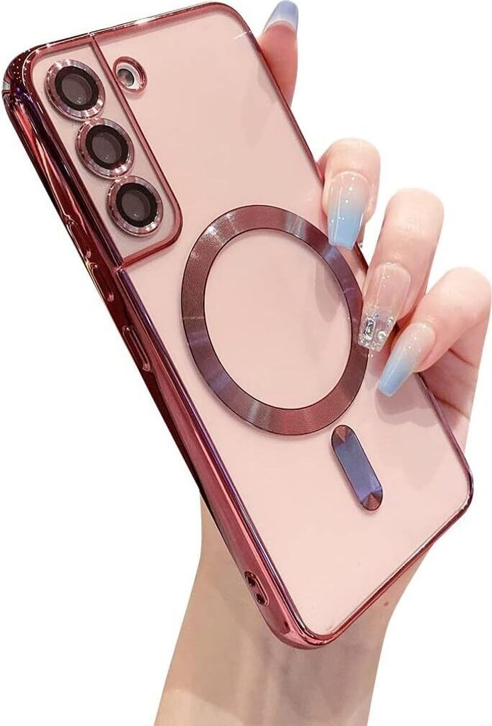 A hand with manicured nails holding a pink phone case with a magnetic ring.