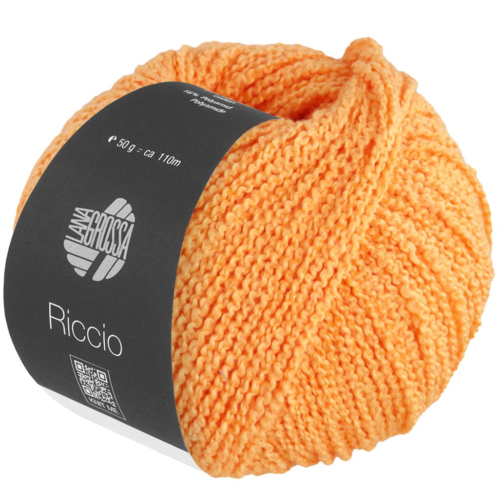 A ball of orange yarn with a black label.