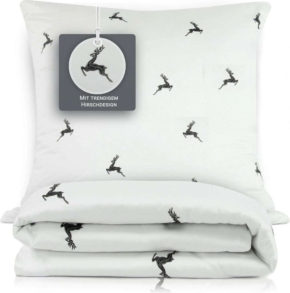 A folded duvet and pillowcase set with a deer pattern, displayed on a white background.