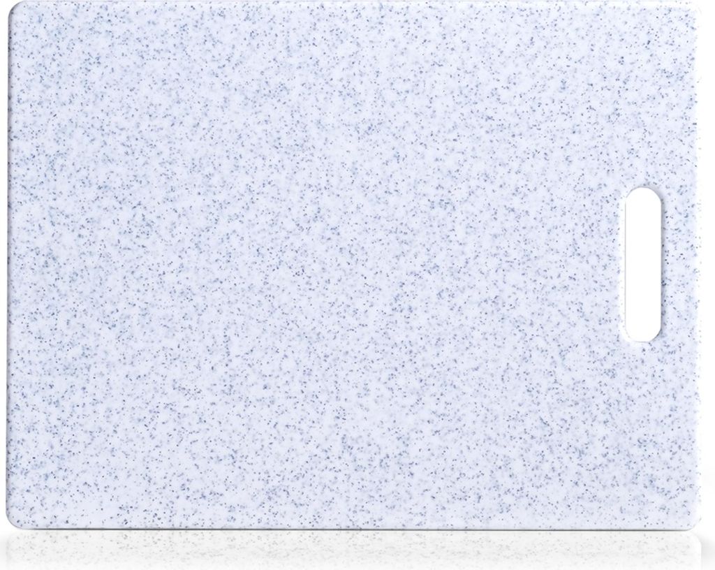 A top-down view of a speckled gray and white cutting board with a handle cutout on the right side.