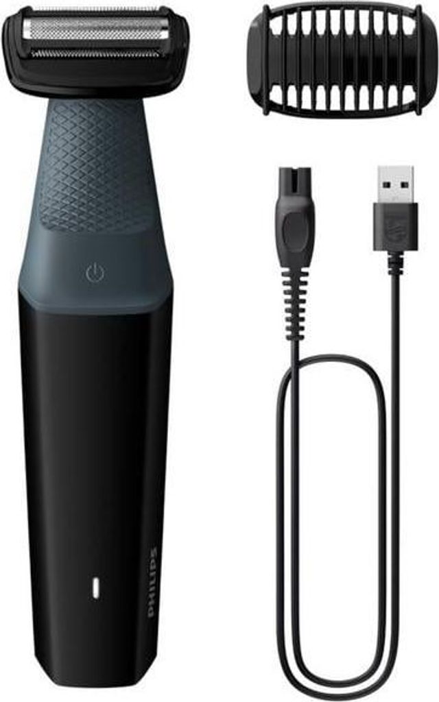 A black and gray electric body hair trimmer with its accessories, including a charging cable and a comb attachment, displayed on a white background.
