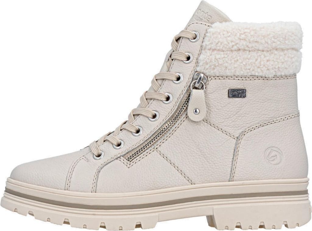 A side view of a white winter boot with laces and a zipper.