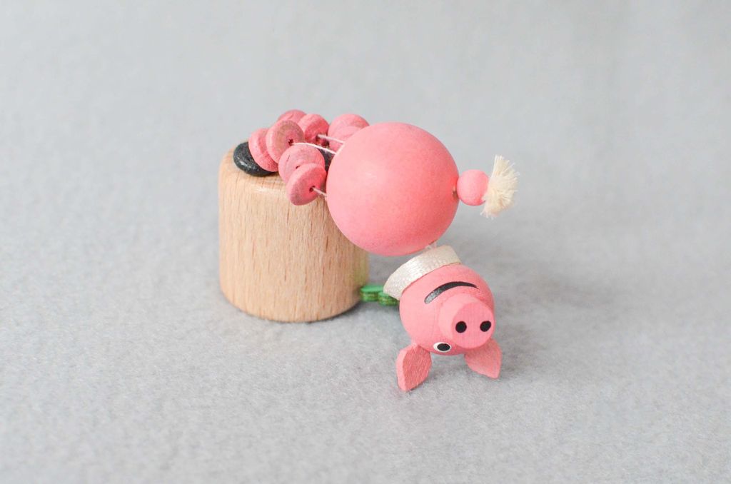 Holzspielzeug Wackeltier Glücksschwein Höhe 7,5cm NEU Produktbild 