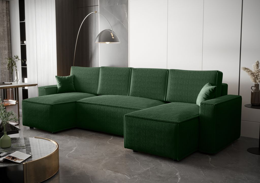 A dark green sectional sofa in a modern living room setting.