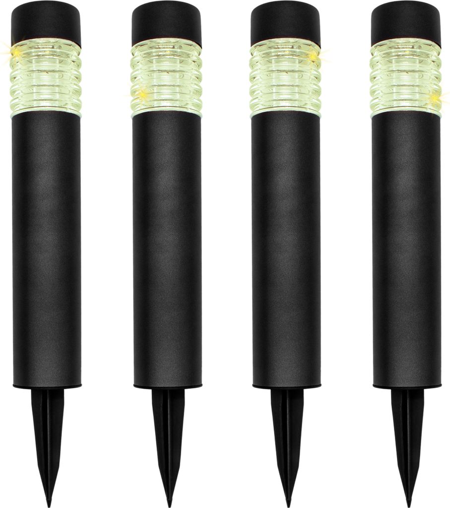 Four black solar garden lights are arranged in a row against a white background.