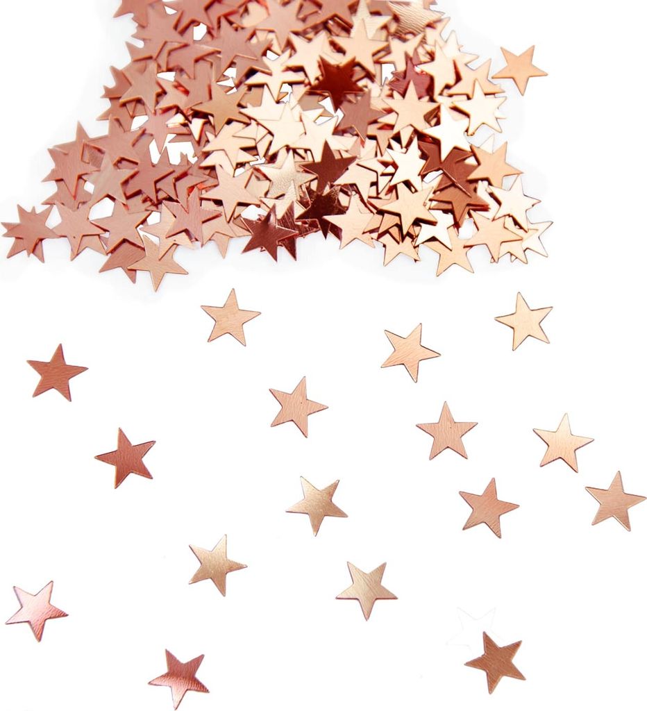 A pile of rose gold star-shaped confetti scattered on a white background.