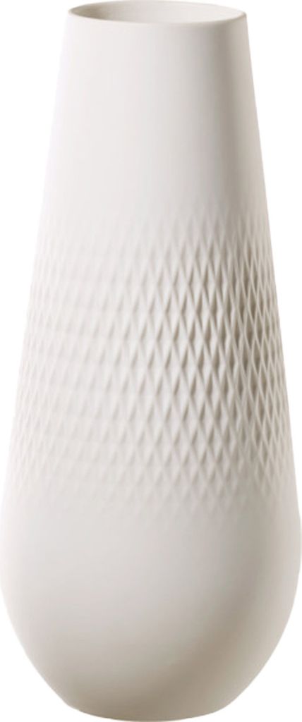 A white vase with a textured diamond pattern.
