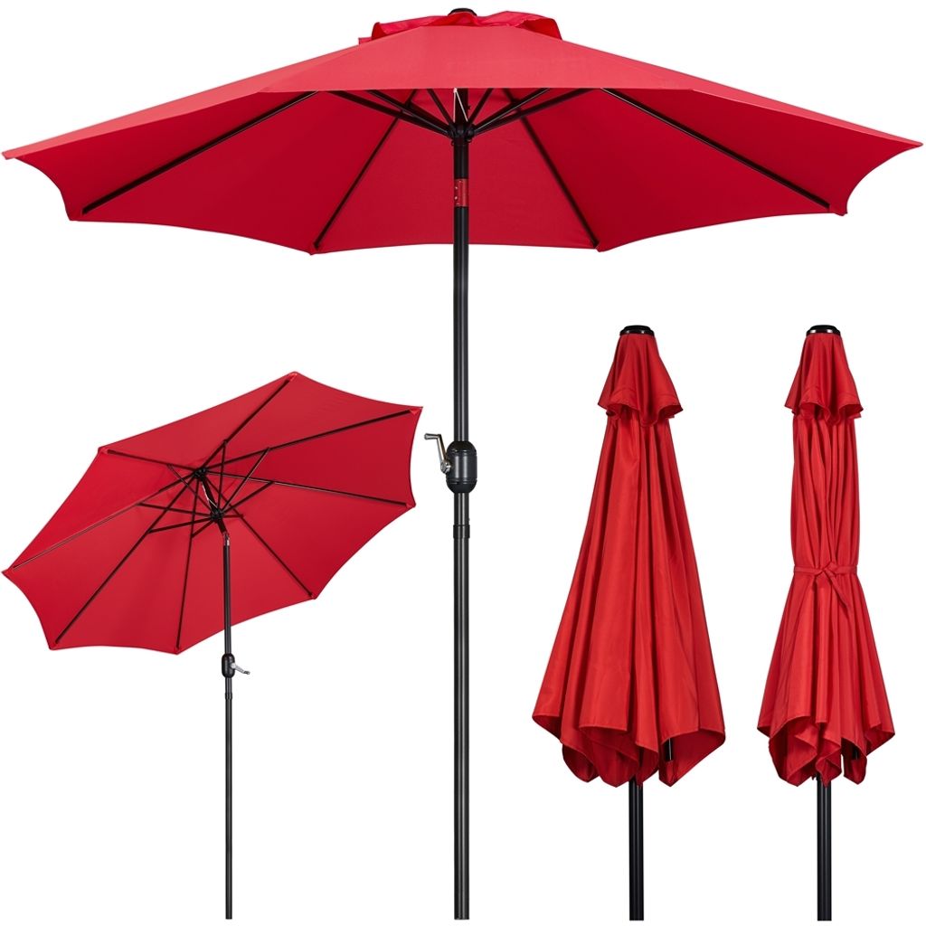 A collection of red patio umbrellas against a white background.