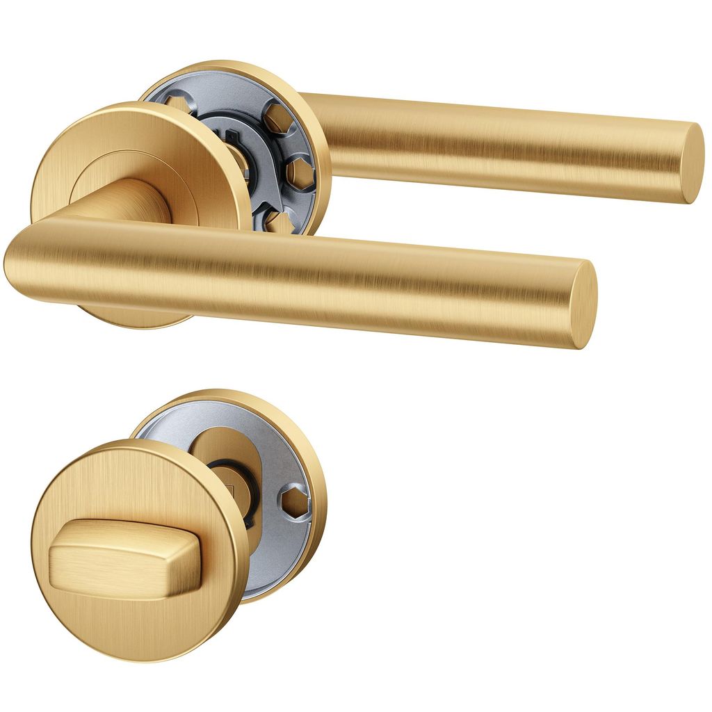 A set of gold-colored door handles and a lock mechanism, presented on a white background.