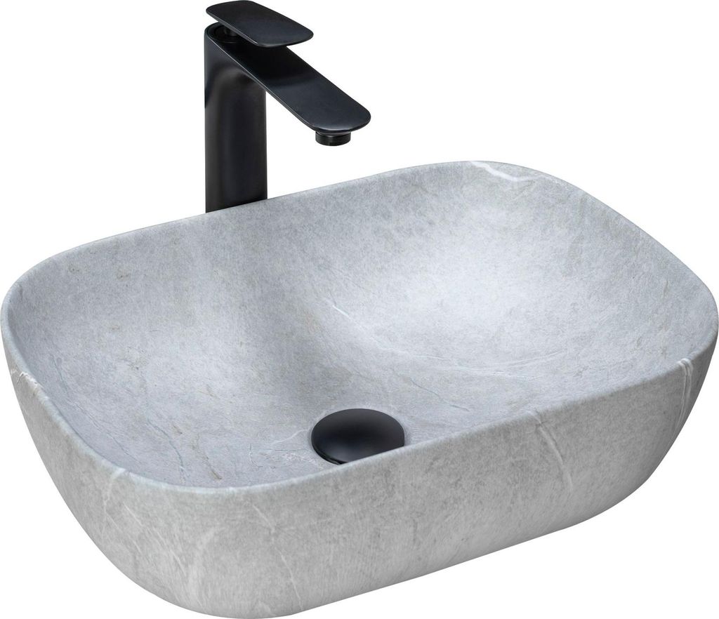 A grey oval countertop sink with a black faucet and drain.