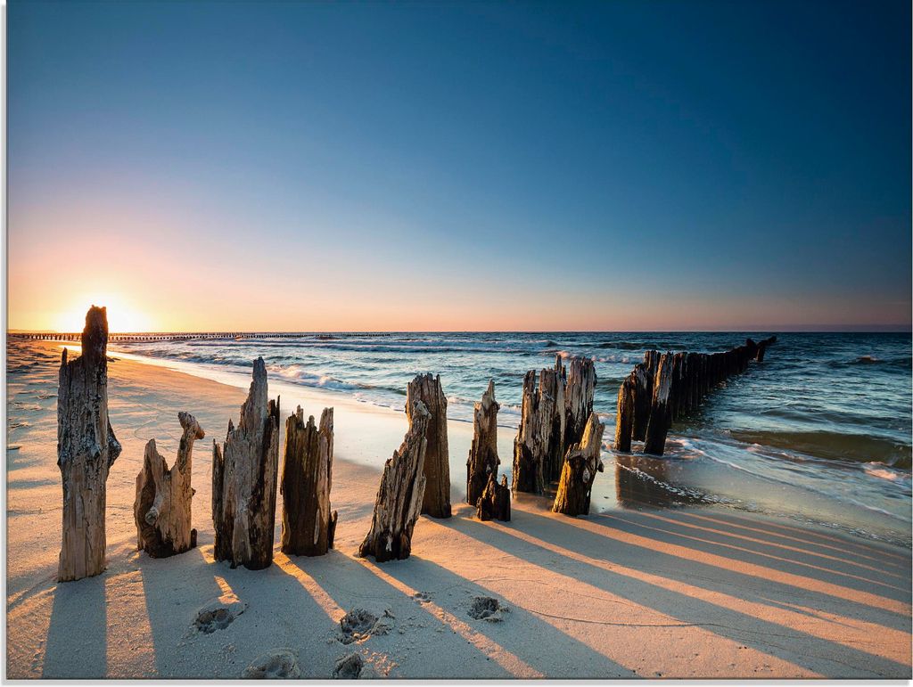 ARTland Glasbild Sonnenuntergang Strand Wellenbrecher Größe: 80x60 cm