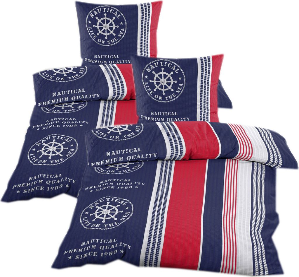 A stack of nautical-themed bedding sets, including pillowcases and duvet covers, displayed against a white background.