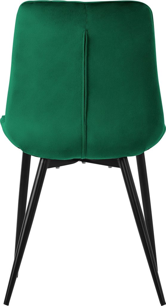 The back view of a dark green velvet chair with black metal legs.