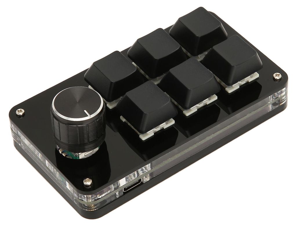 A black programmable keyboard with a rotary knob and six keys is shown on a white background.