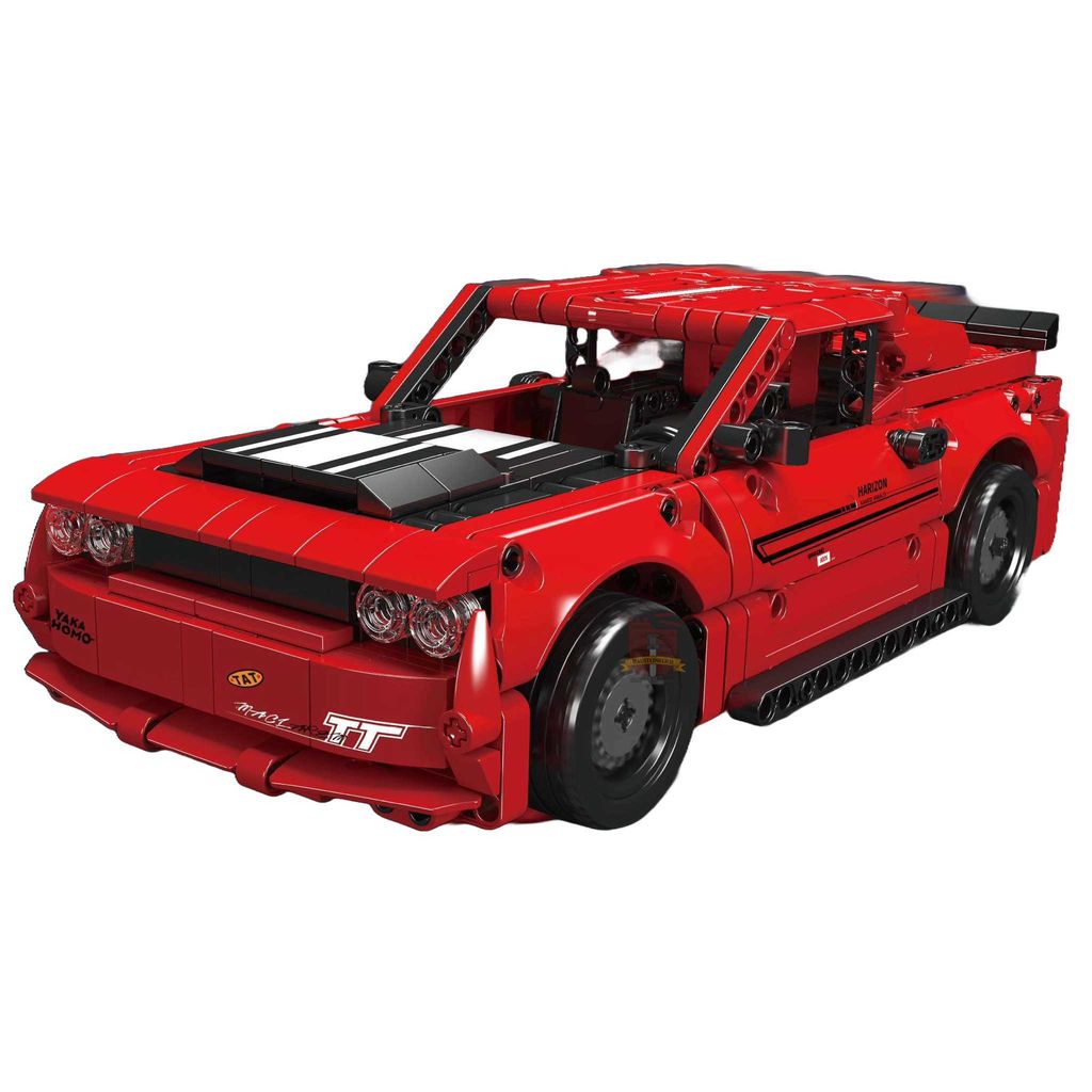 A red toy car model of a muscle car.