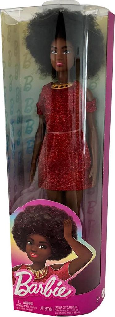 A Barbie doll in its packaging, with a graphic of the doll on the front.