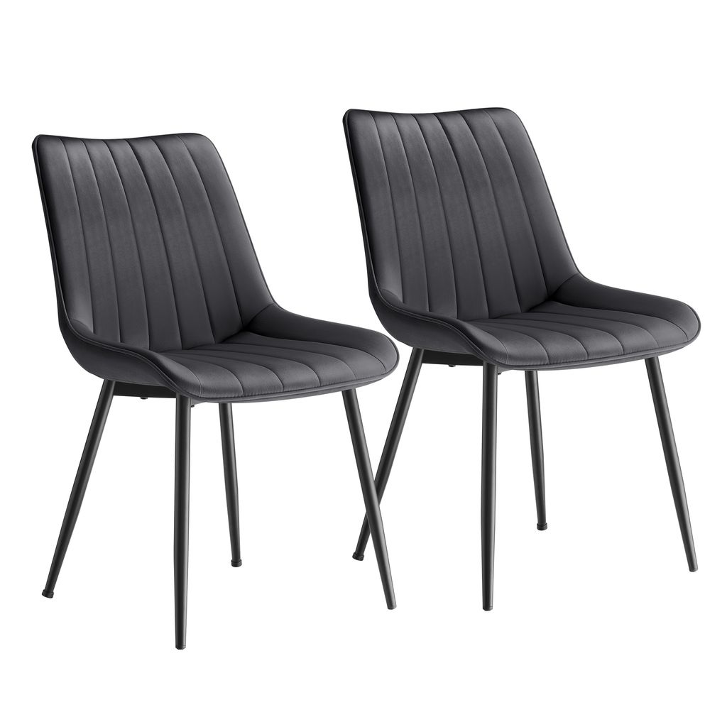 Two black dining chairs with metal legs are shown against a white background.