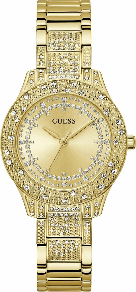 A close-up studio shot of a gold-colored Guess watch with crystal embellishments.
