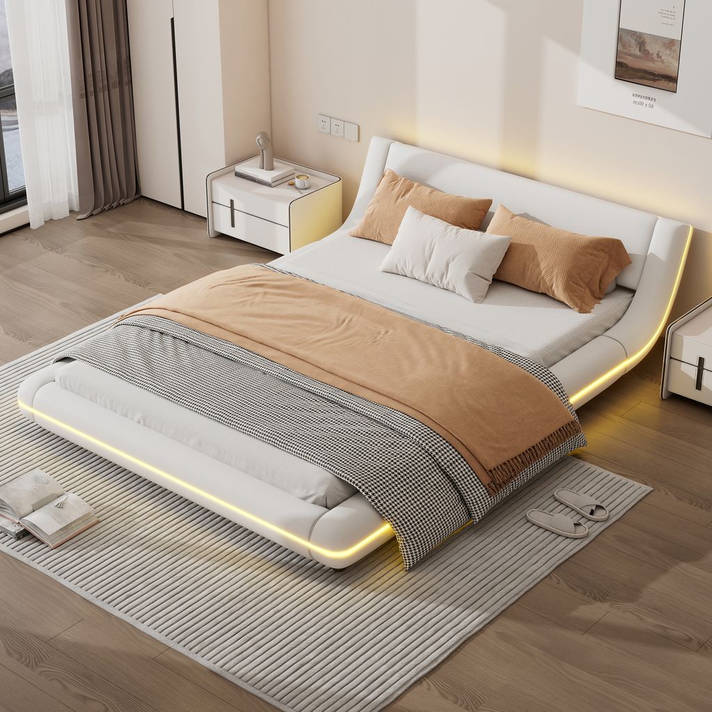 A modern bedroom with a white upholstered bed, nightstands, and a window with curtains.