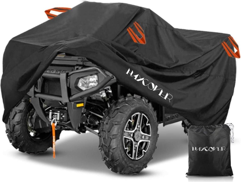 A black ATV cover is shown on an ATV, with a storage bag also visible.