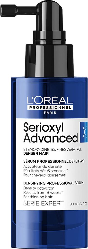 A bottle of L'Oréal Serioxyl Advanced hair serum.