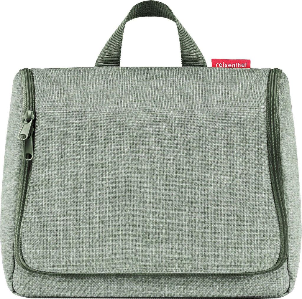 A gray toiletry bag with green zippers and a handle is shown against a white background.