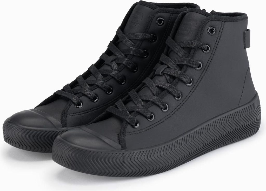 A pair of black high-top sneakers with a thick, textured sole, shown against a white background.