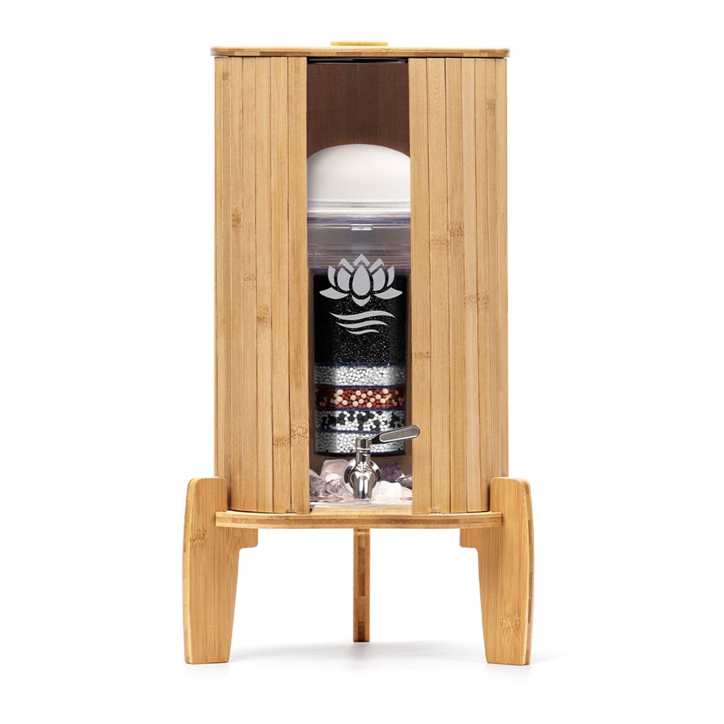 A water filter in a wooden stand against a white background.