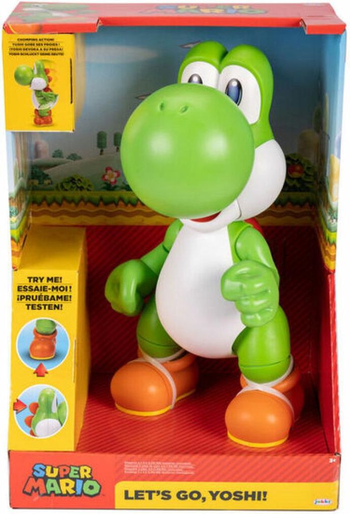 A toy Yoshi figure in its retail packaging, displayed against a backdrop that mimics a game environment.