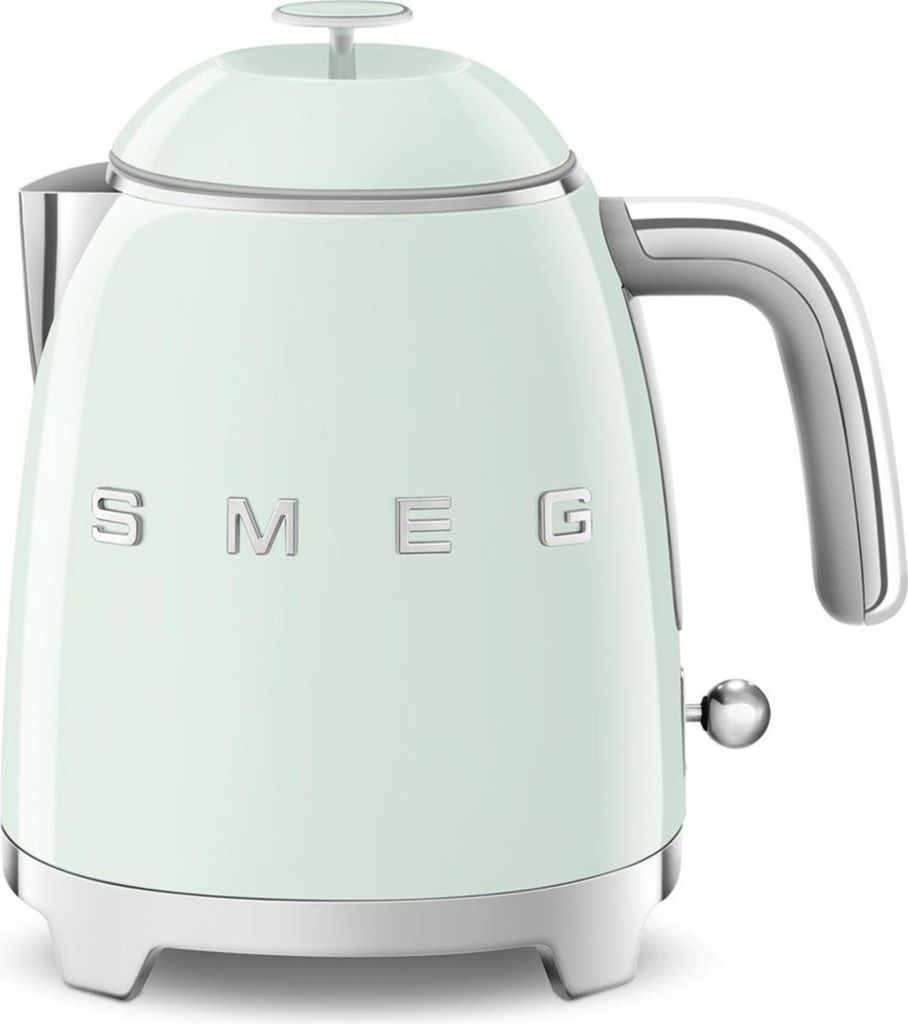 A pastel green Smeg mini kettle on a white background.