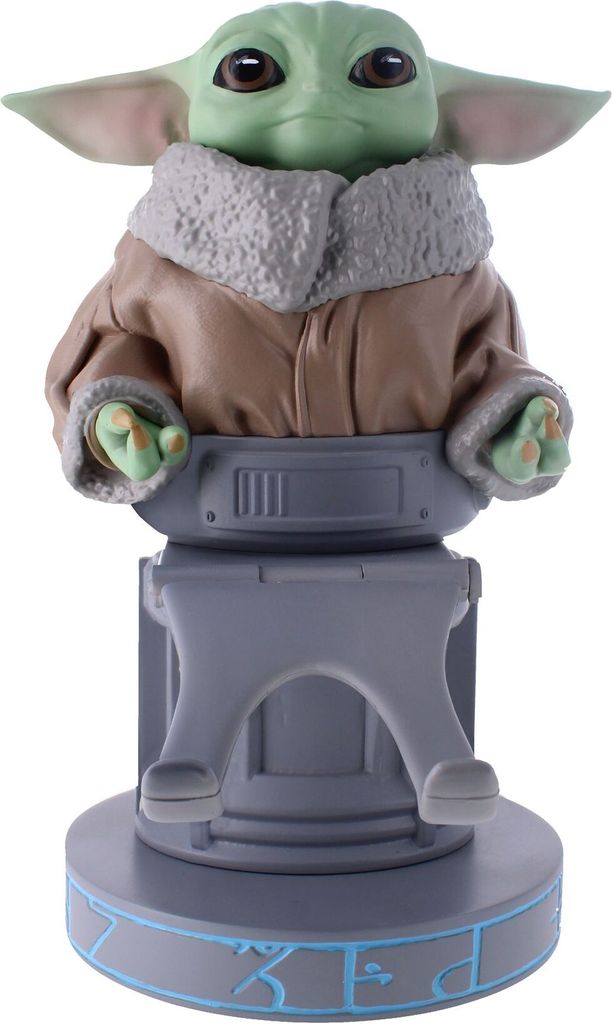 A figurine of Grogu from Star Wars, also known as Baby Yoda, is displayed on a pedestal.
