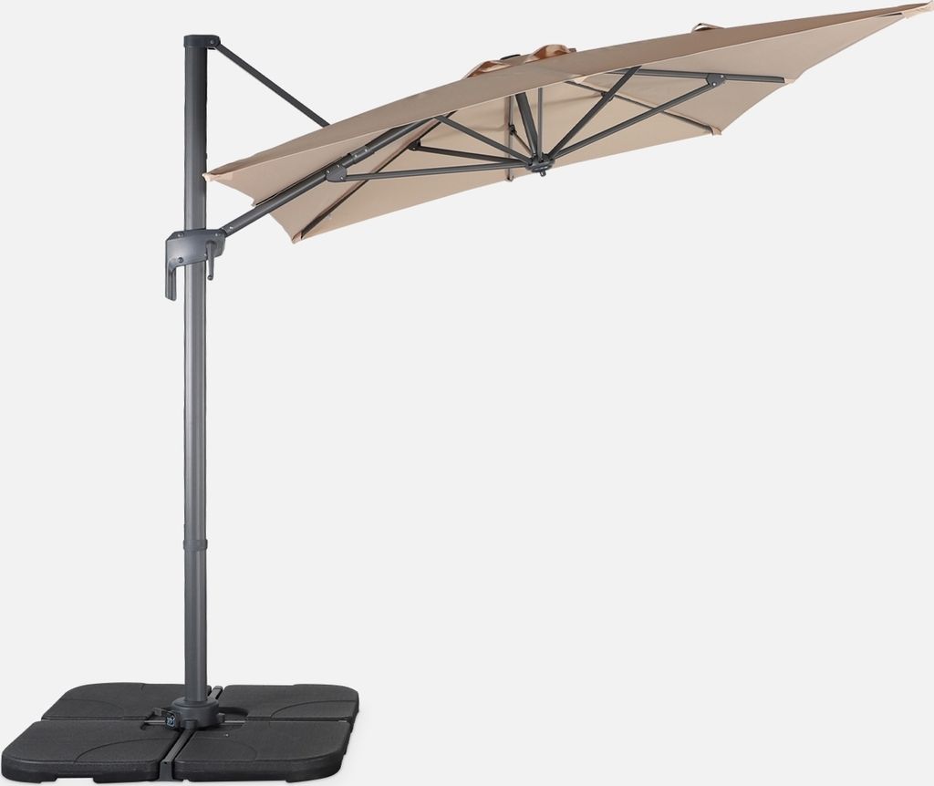 A cantilever umbrella with a beige canopy and a gray pole and base, isolated on a white background.