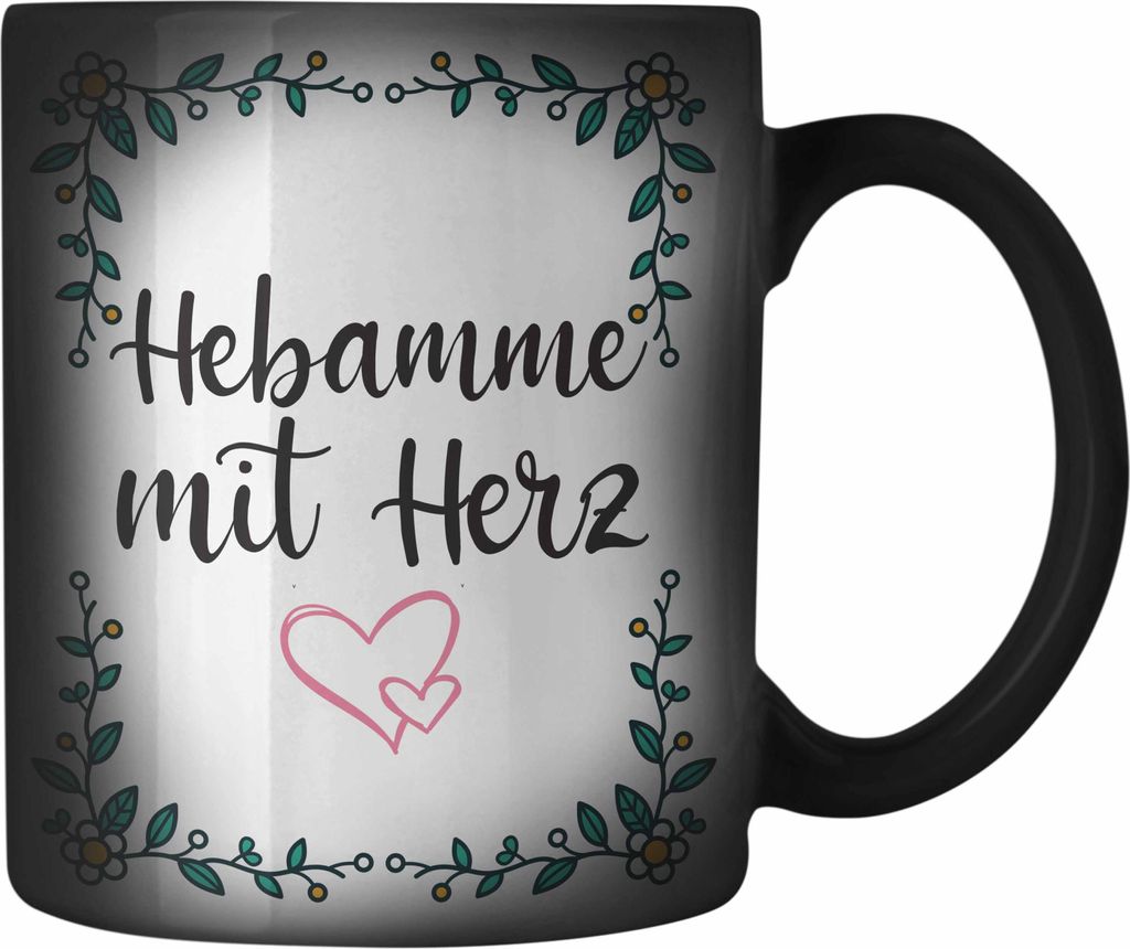 Trendation - Hebamme mit Herz Farbwechsel Zauber-Tasse mit Spruch Geschenk (Schwarz)