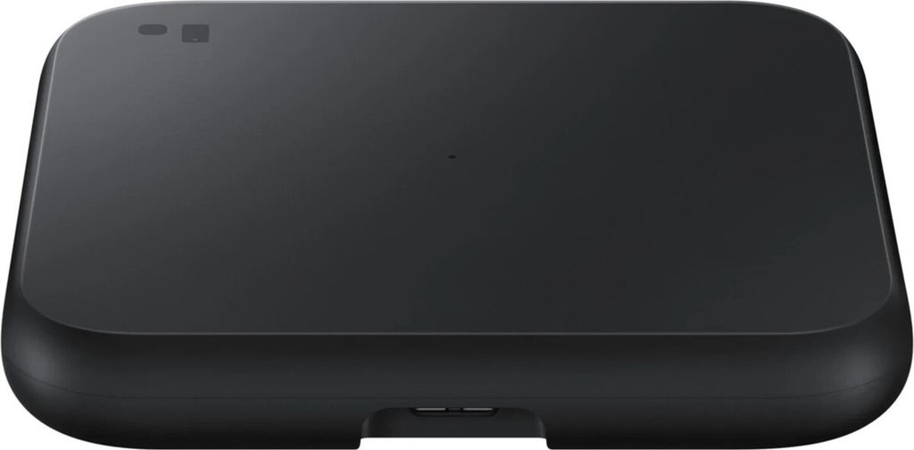 A black wireless charger pad is shown from a top-down perspective on a white background.