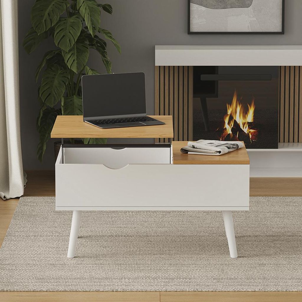 A modern living room with a coffee table in front of a fireplace.
