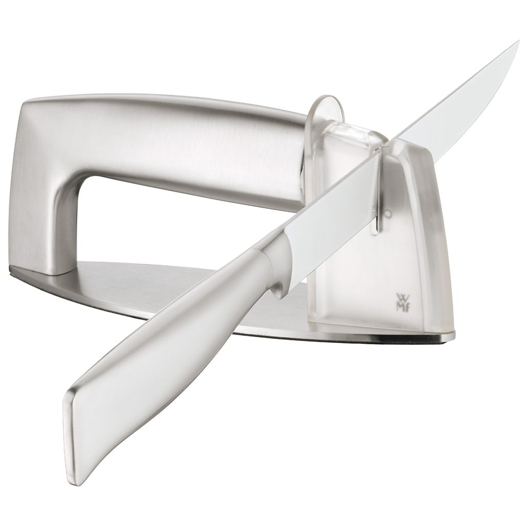 A knife sharpener with a knife being sharpened.